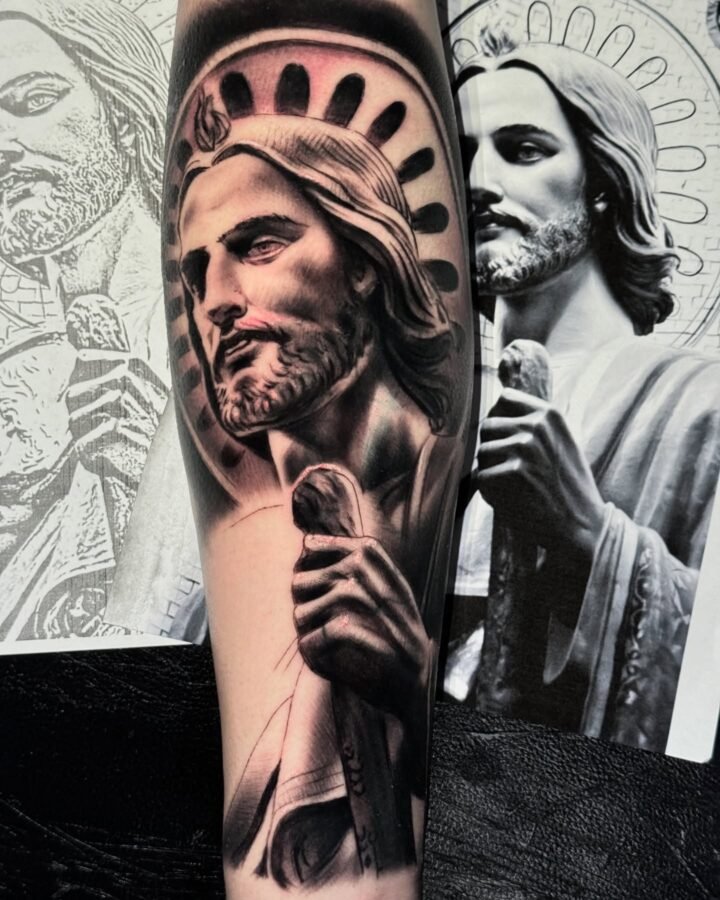 Black and grey religious portrait tattoo worked from a statue reference photograph